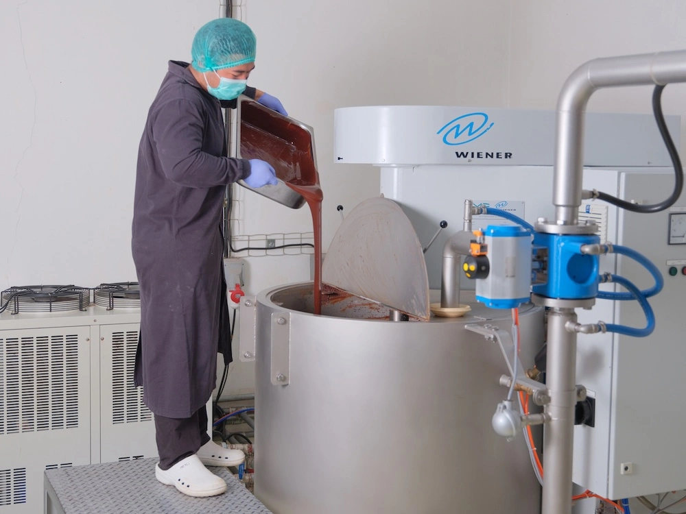 Chocolate making process during Bali electric vehicle tour